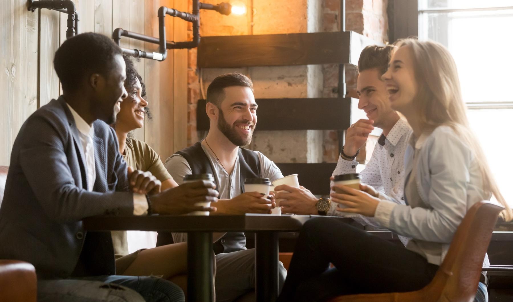 a group of people sitting at a table